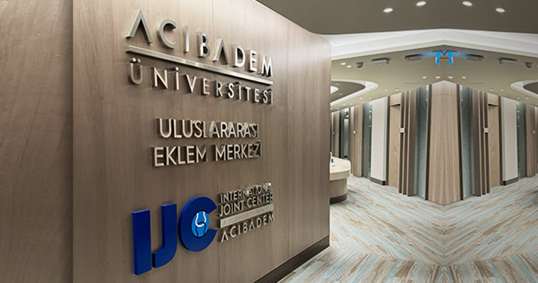 Acibadem University and IJC branding wall
